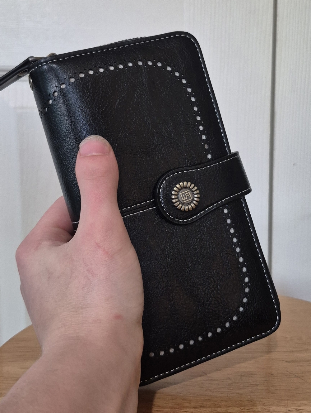 Black wallet three quarter zip With Snap Closure By Charm Infinite